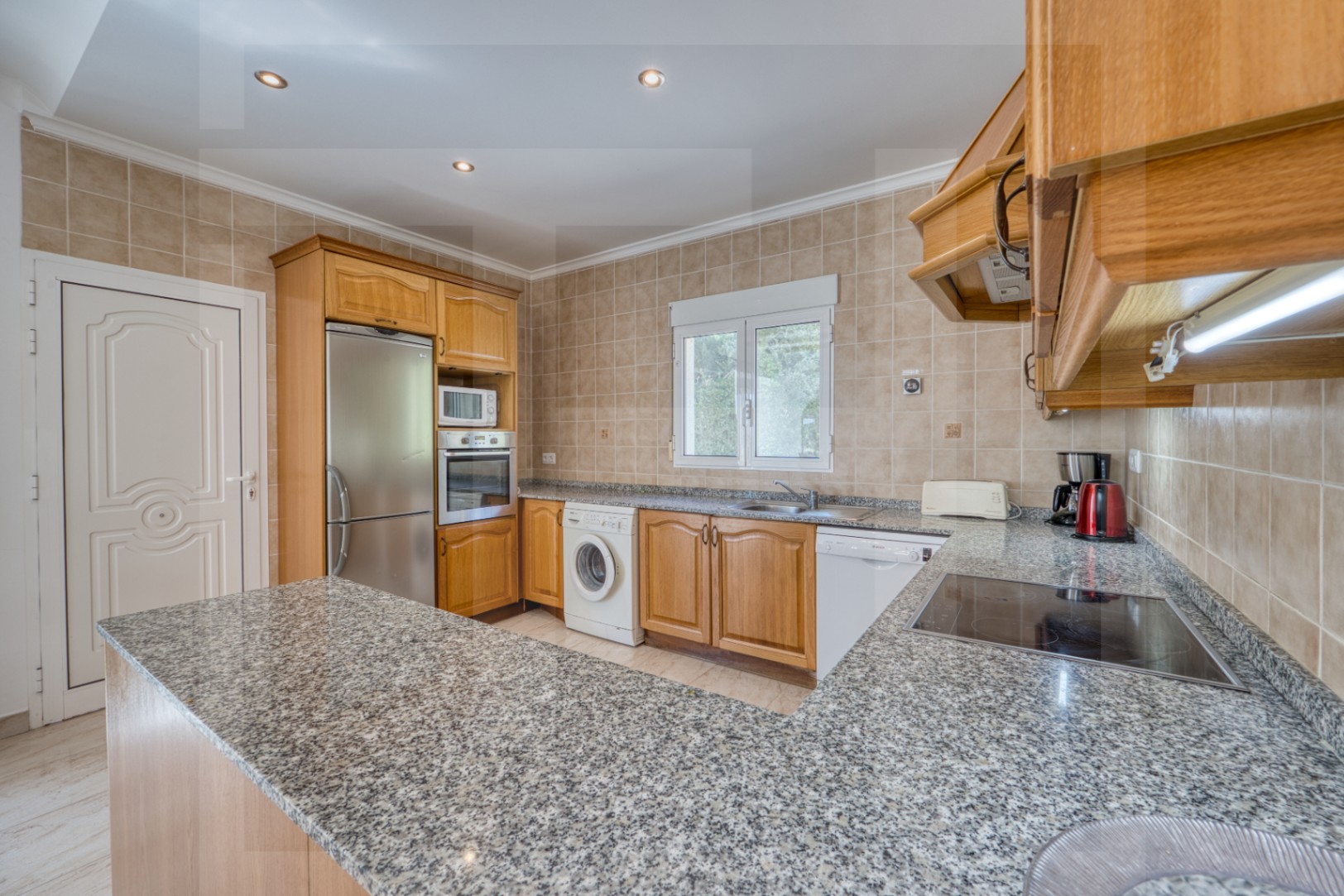 Villa for sale in La Sella with views of the sea, golf, and Montgó.
