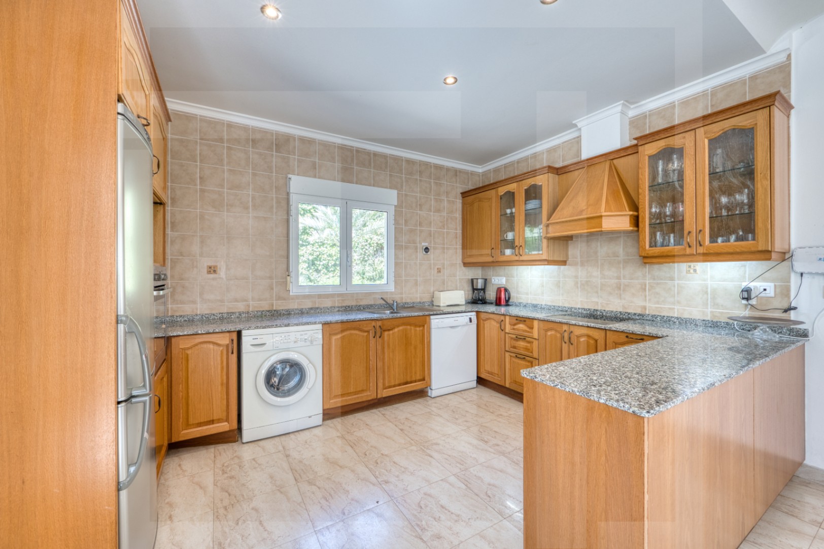 Villa for sale in La Sella with views of the sea, golf, and Montgó.